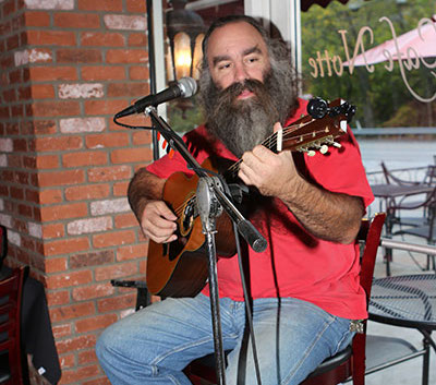 Guitarist playing outside