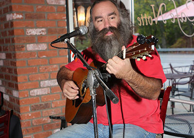 Guitarist playing outside